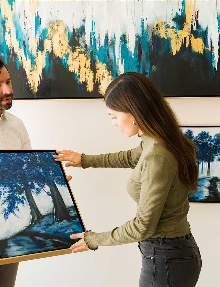 Woman looking at a piece of art Woman looking at a piece of art