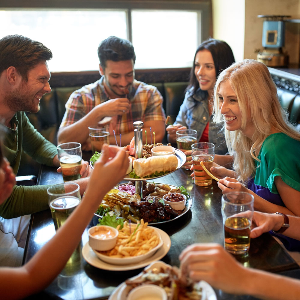 Group of people in a pub Group of people in a pub