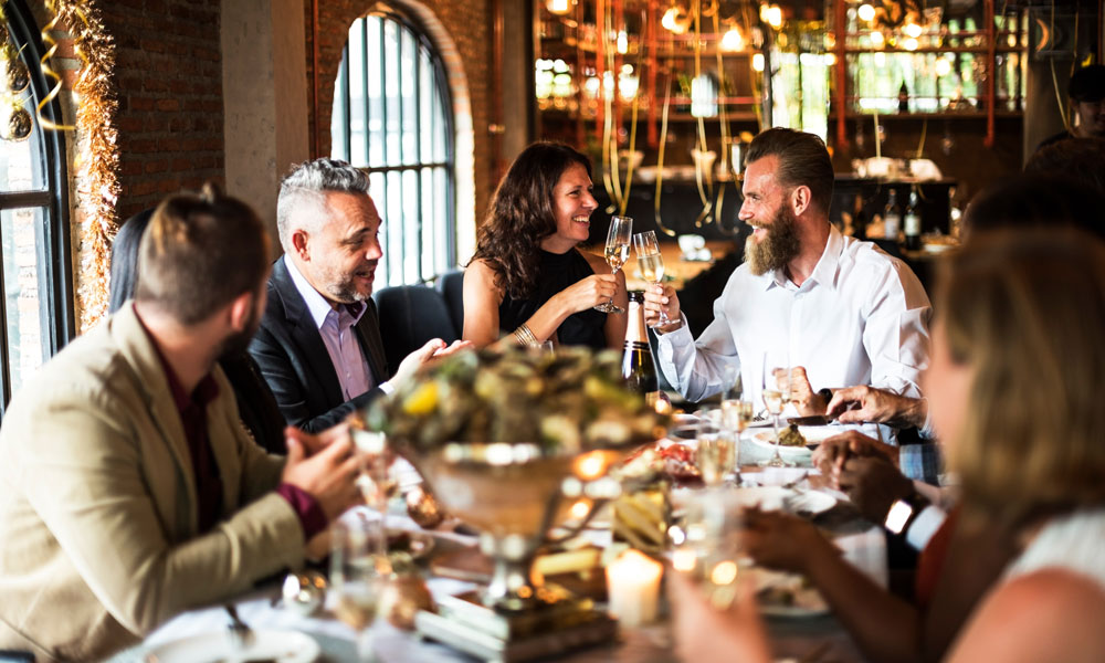 A group enjoying a meal in a restaurant