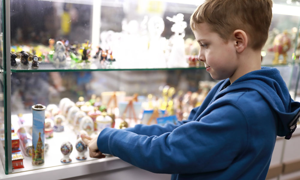 Choosing a souvenir Boy choosing a souvenir