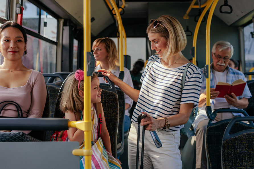 mother-and-daughter-on-a-bus A mother and a daughter on a bus