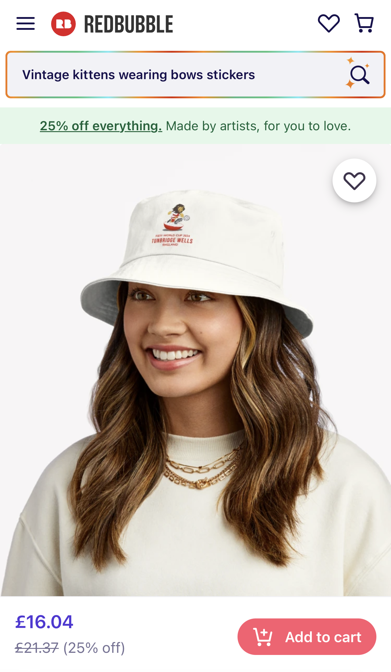 A lady wearing a white bucket hat with a subbuteo logo on it