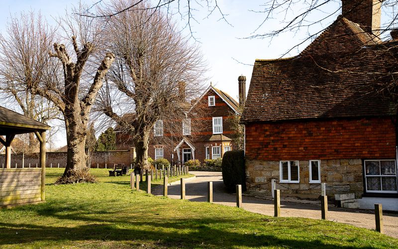 Driveway on the edge of a green