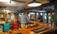 The Nevill Crest & Gun bar